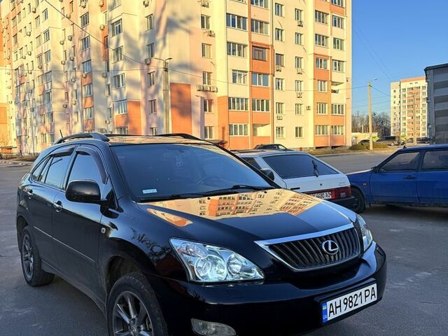 Черный Лексус РХ, объемом двигателя 3.5 л и пробегом 160 тыс. км за 8500 $, фото 1 на Automoto.ua