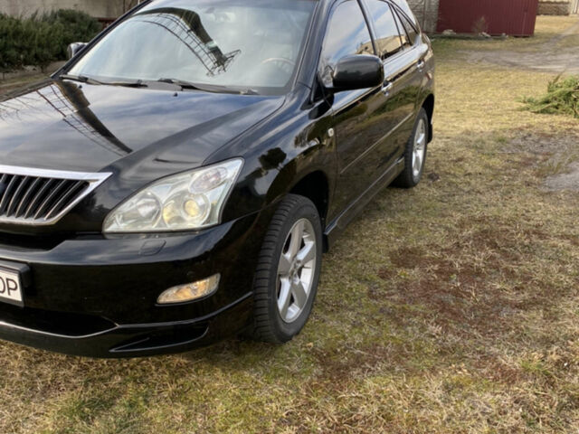 Чорний Лексус РХ, об'ємом двигуна 3.46 л та пробігом 167 тис. км за 13800 $, фото 1 на Automoto.ua