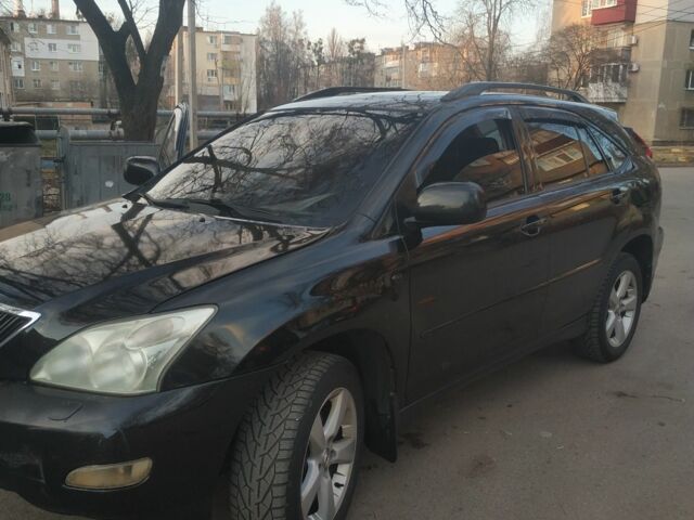 Черный Лексус РХ, объемом двигателя 3.5 л и пробегом 285 тыс. км за 8400 $, фото 1 на Automoto.ua