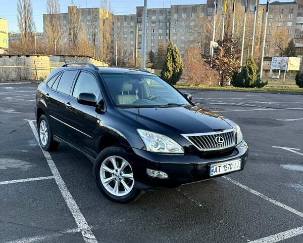 Черный Лексус РХ, объемом двигателя 3.46 л и пробегом 239 тыс. км за 13500 $, фото 1 на Automoto.ua