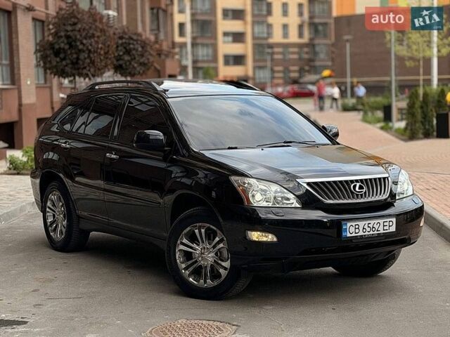 Черный Лексус РХ, объемом двигателя 3.5 л и пробегом 247 тыс. км за 11500 $, фото 1 на Automoto.ua
