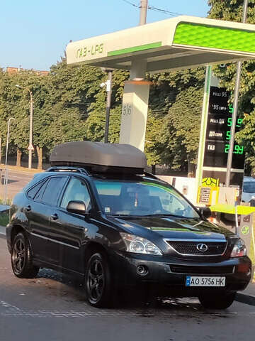 Черный Лексус РХ, объемом двигателя 3.31 л и пробегом 294 тыс. км за 10500 $, фото 1 на Automoto.ua