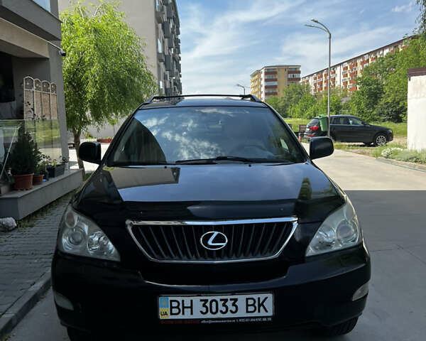 Черный Лексус РХ, объемом двигателя 3.46 л и пробегом 315 тыс. км за 9000 $, фото 1 на Automoto.ua