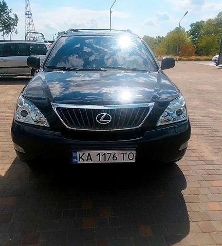 Черный Лексус РХ, объемом двигателя 3.5 л и пробегом 262 тыс. км за 15000 $, фото 1 на Automoto.ua