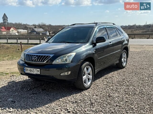 Черный Лексус РХ, объемом двигателя 3.46 л и пробегом 246 тыс. км за 8300 $, фото 1 на Automoto.ua