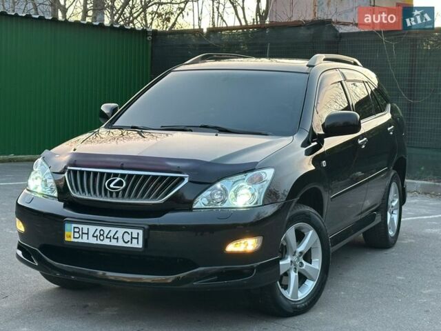 Черный Лексус РХ, объемом двигателя 3.46 л и пробегом 238 тыс. км за 9400 $, фото 1 на Automoto.ua