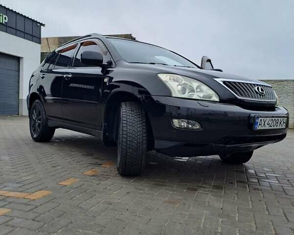 Черный Лексус РХ, объемом двигателя 3.46 л и пробегом 270 тыс. км за 9700 $, фото 1 на Automoto.ua