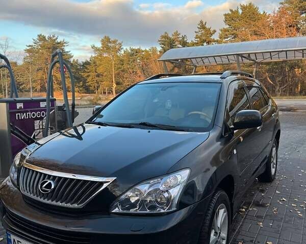 Черный Лексус РХ, объемом двигателя 3.3 л и пробегом 263 тыс. км за 13900 $, фото 1 на Automoto.ua