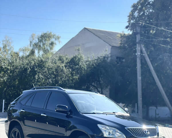 Черный Лексус РХ, объемом двигателя 3.46 л и пробегом 277 тыс. км за 9300 $, фото 1 на Automoto.ua