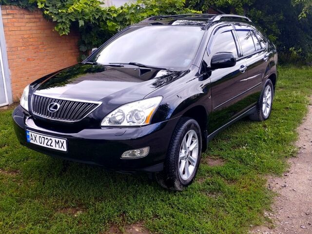 Черный Лексус РХ, объемом двигателя 3.5 л и пробегом 187 тыс. км за 11200 $, фото 1 на Automoto.ua