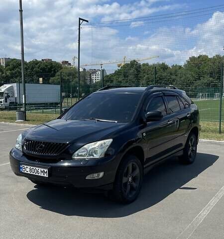 Чорний Лексус РХ, об'ємом двигуна 3.46 л та пробігом 205 тис. км за 16000 $, фото 1 на Automoto.ua
