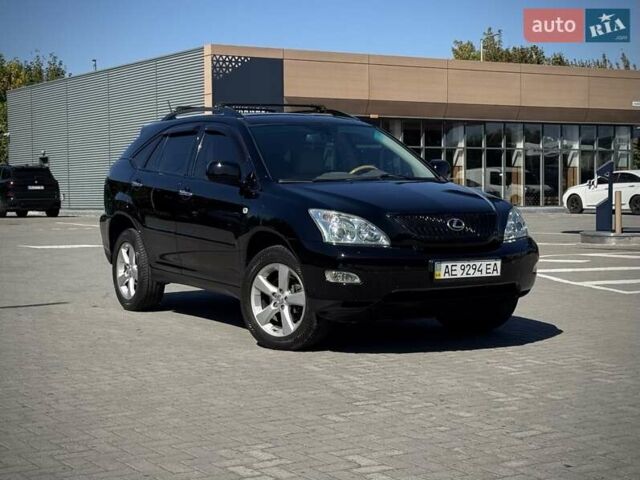 Черный Лексус РХ, объемом двигателя 3.5 л и пробегом 177 тыс. км за 11900 $, фото 1 на Automoto.ua