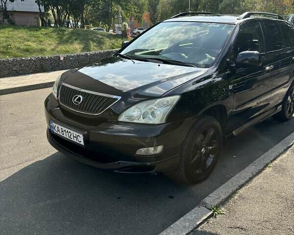Черный Лексус РХ, объемом двигателя 3.46 л и пробегом 295 тыс. км за 11000 $, фото 1 на Automoto.ua
