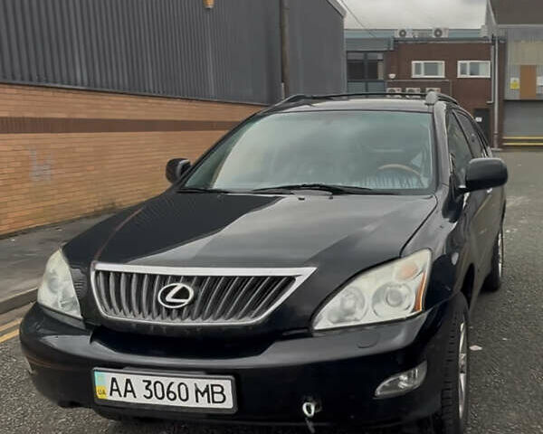 Черный Лексус РХ, объемом двигателя 3.46 л и пробегом 300 тыс. км за 7000 $, фото 1 на Automoto.ua