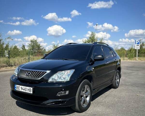 Черный Лексус РХ, объемом двигателя 3.46 л и пробегом 165 тыс. км за 13400 $, фото 1 на Automoto.ua
