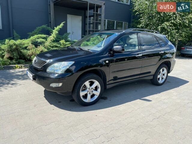 Черный Лексус РХ, объемом двигателя 3.5 л и пробегом 199 тыс. км за 11950 $, фото 1 на Automoto.ua