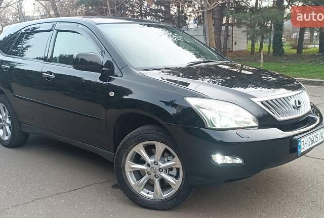 Чорний Лексус РХ, об'ємом двигуна 3.46 л та пробігом 259 тис. км за 10500 $, фото 1 на Automoto.ua