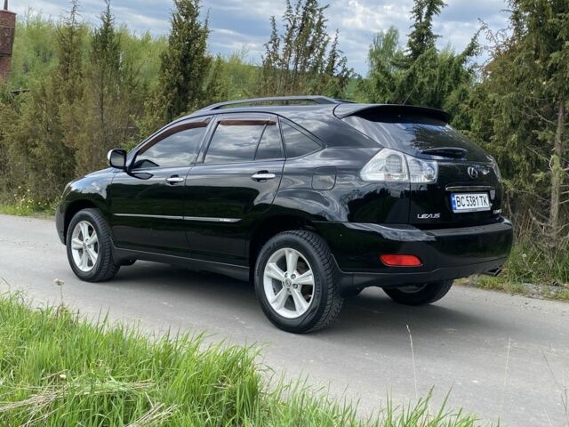 Черный Лексус РХ, объемом двигателя 3.3 л и пробегом 248 тыс. км за 12500 $, фото 1 на Automoto.ua