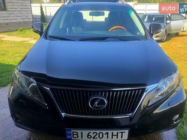 Черный Лексус РХ, объемом двигателя 3.5 л и пробегом 106 тыс. км за 17500 $, фото 1 на Automoto.ua