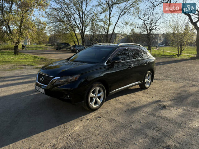 Черный Лексус РХ, объемом двигателя 3.5 л и пробегом 200 тыс. км за 16500 $, фото 1 на Automoto.ua