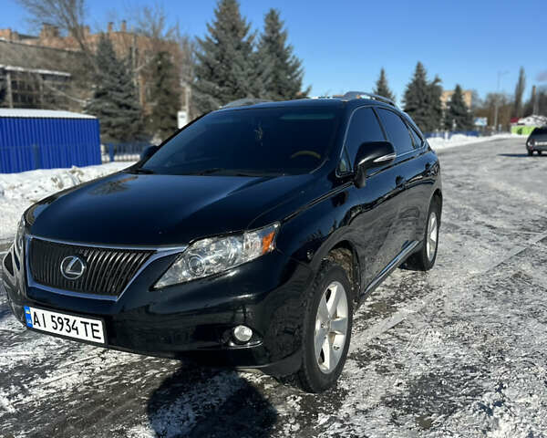 Черный Лексус РХ, объемом двигателя 3.46 л и пробегом 278 тыс. км за 15800 $, фото 1 на Automoto.ua