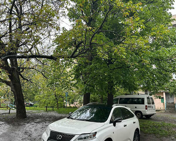 Черный Лексус РХ, объемом двигателя 3.5 л и пробегом 125 тыс. км за 22890 $, фото 1 на Automoto.ua