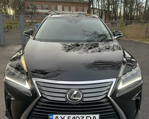 Черный Лексус РХ, объемом двигателя 3.46 л и пробегом 202 тыс. км за 28000 $, фото 1 на Automoto.ua