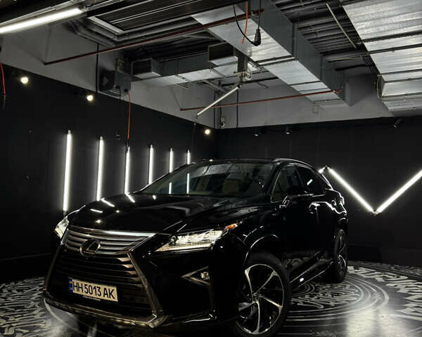 Черный Лексус РХ, объемом двигателя 3.5 л и пробегом 130 тыс. км за 30900 $, фото 1 на Automoto.ua