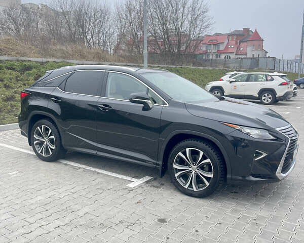 Черный Лексус РХ, объемом двигателя 2 л и пробегом 189 тыс. км за 28900 $, фото 1 на Automoto.ua