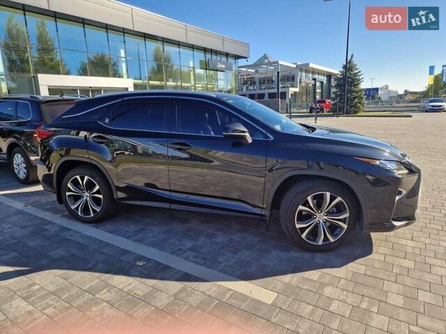 Чорний Лексус РХ, об'ємом двигуна 2 л та пробігом 90 тис. км за 33900 $, фото 1 на Automoto.ua