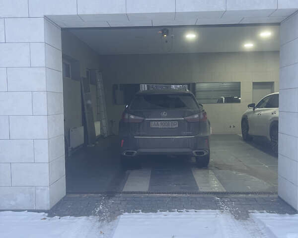 Черный Лексус РХ, объемом двигателя 2 л и пробегом 100 тыс. км за 39900 $, фото 1 на Automoto.ua