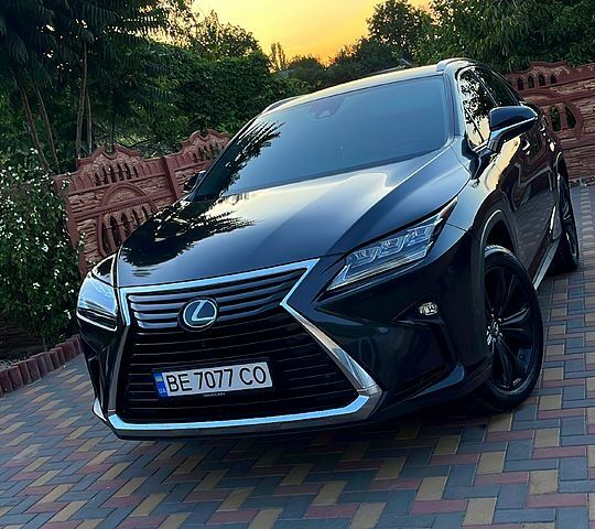 Чорний Лексус РХ, об'ємом двигуна 2 л та пробігом 135 тис. км за 36700 $, фото 1 на Automoto.ua