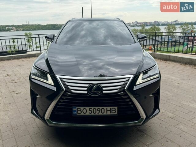 Черный Лексус РХ, объемом двигателя 3.46 л и пробегом 127 тыс. км за 35900 $, фото 1 на Automoto.ua