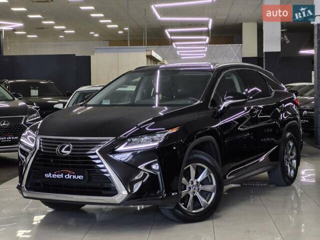 Чорний Лексус РХ, об'ємом двигуна 2 л та пробігом 70 тис. км за 34999 $, фото 1 на Automoto.ua