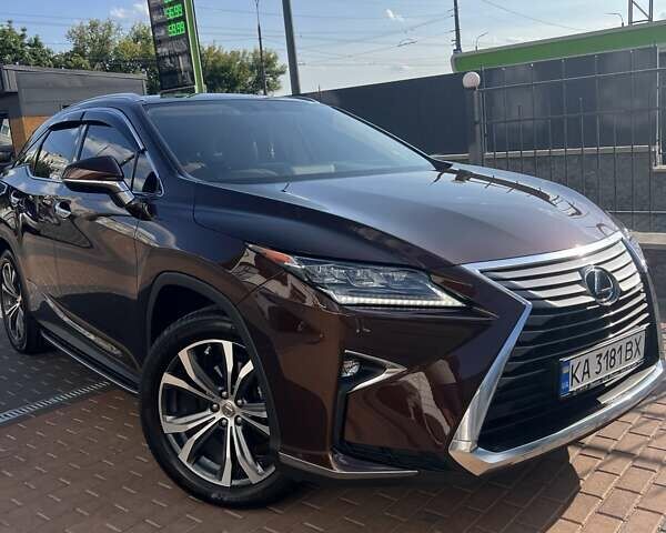 Коричневий Лексус РХ, об'ємом двигуна 2 л та пробігом 129 тис. км за 35500 $, фото 1 на Automoto.ua