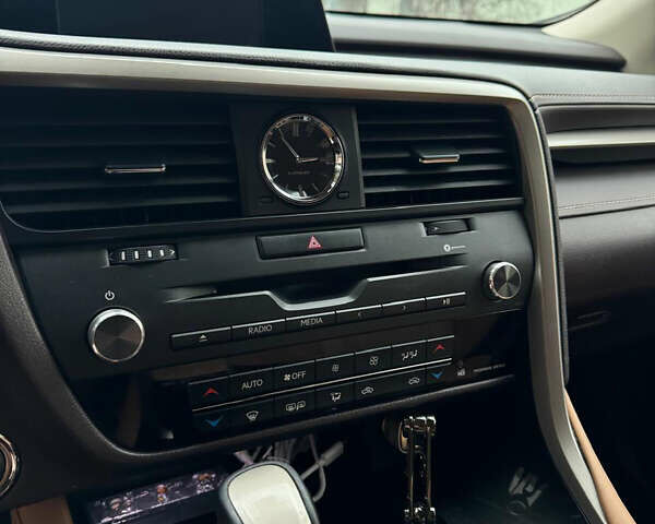 Коричневый Лексус РХ, объемом двигателя 2 л и пробегом 112 тыс. км за 30500 $, фото 1 на Automoto.ua