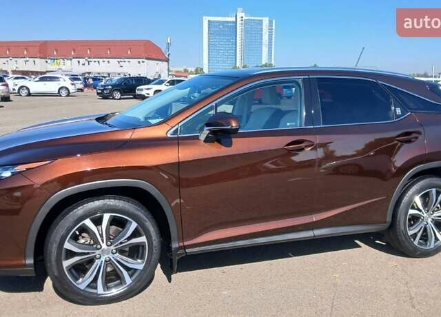 Коричневий Лексус РХ, об'ємом двигуна 2 л та пробігом 70 тис. км за 37700 $, фото 1 на Automoto.ua