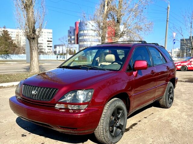Красный Лексус РХ, объемом двигателя 3 л и пробегом 229 тыс. км за 5299 $, фото 1 на Automoto.ua