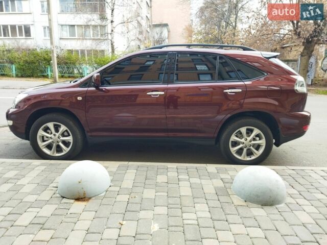 Красный Лексус РХ, объемом двигателя 3.46 л и пробегом 190 тыс. км за 13000 $, фото 1 на Automoto.ua