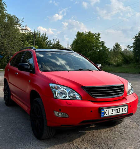 Красный Лексус РХ, объемом двигателя 3.5 л и пробегом 290 тыс. км за 10377 $, фото 1 на Automoto.ua