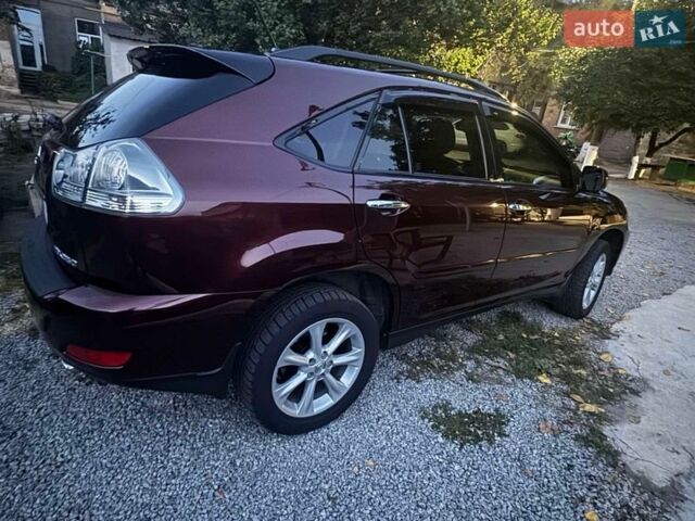 Червоний Лексус РХ, об'ємом двигуна 3.46 л та пробігом 167 тис. км за 10800 $, фото 1 на Automoto.ua