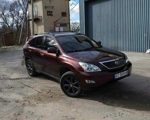 Красный Лексус РХ, объемом двигателя 3.5 л и пробегом 206 тыс. км за 14900 $, фото 1 на Automoto.ua