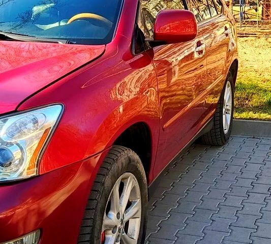 Красный Лексус РХ, объемом двигателя 3.3 л и пробегом 219 тыс. км за 10300 $, фото 1 на Automoto.ua