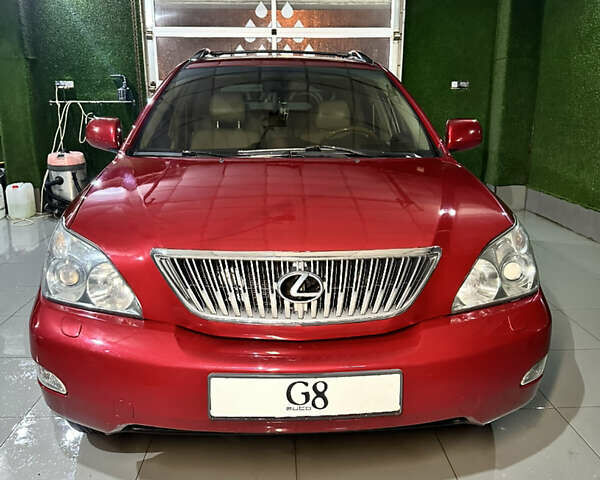 Красный Лексус РХ, объемом двигателя 3.46 л и пробегом 260 тыс. км за 11300 $, фото 1 на Automoto.ua