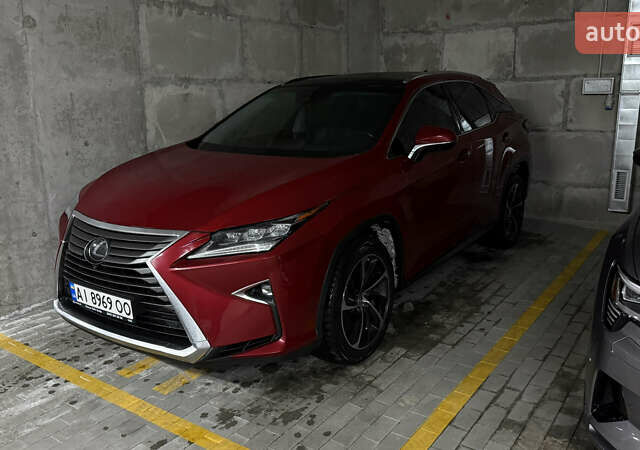 Красный Лексус РХ, объемом двигателя 3.46 л и пробегом 150 тыс. км за 32500 $, фото 1 на Automoto.ua