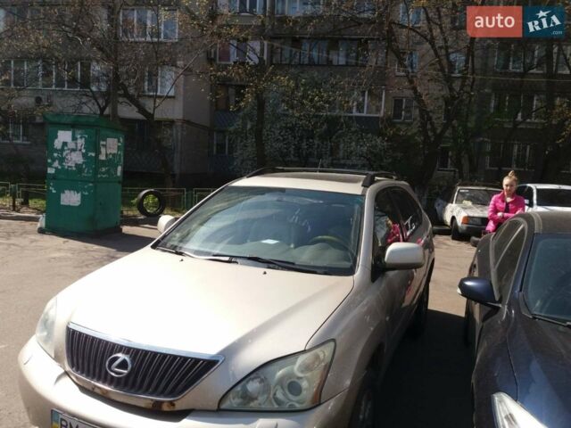 Желтый Лексус РХ, объемом двигателя 3.31 л и пробегом 560 тыс. км за 4999 $, фото 1 на Automoto.ua