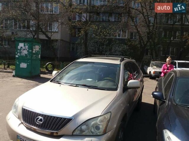 Желтый Лексус РХ, объемом двигателя 3.31 л и пробегом 390 тыс. км за 6000 $, фото 1 на Automoto.ua