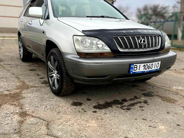 Сірий Лексус РХ, об'ємом двигуна 3 л та пробігом 344 тис. км за 5600 $, фото 1 на Automoto.ua