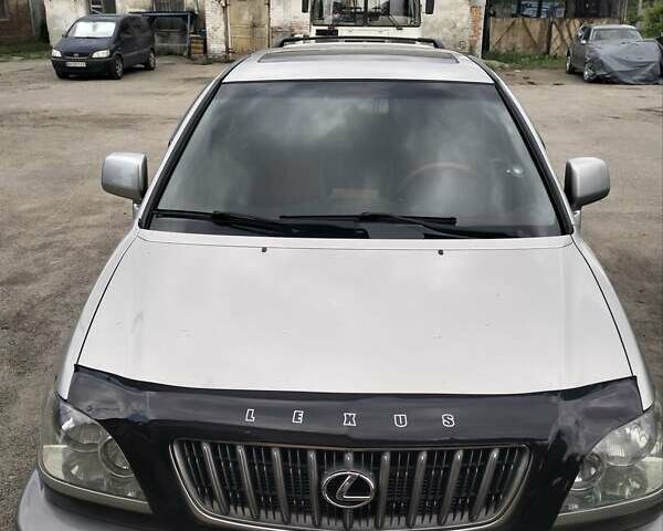 Серый Лексус РХ, объемом двигателя 3 л и пробегом 335 тыс. км за 5350 $, фото 1 на Automoto.ua