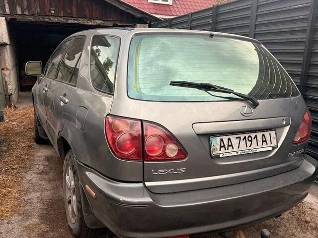 Сірий Лексус РХ, об'ємом двигуна 3 л та пробігом 294 тис. км за 3200 $, фото 1 на Automoto.ua